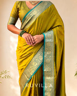 Mehendi Green Soft Patola Silk Saree with Bandhani Weaves & Rich Zari Border