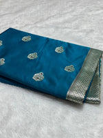 Peacock Blue banarasi Mashru Katan Silk Saree featuring zari butti work and heavy woven pallu.