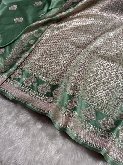 Olive Green Mashru Katan Silk Banarasi Saree with zari butti weaving by Ruvilla